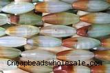 AGAT288 15 inches 10*30mm faceted rice rainbow agate beads