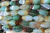 AGAT297 15 inches 10*20mm faceted twisted rice rainbow agate beads