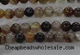 CAA1035 15.5 inches 4mm round dragon veins agate beads wholesale