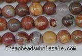 CAA1221 15.5 inches 6mm round gold mountain agate beads