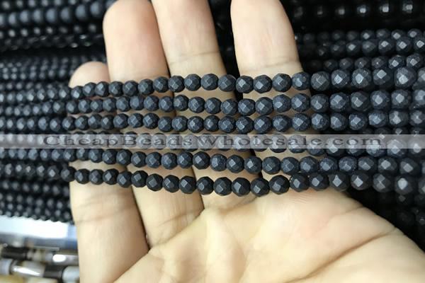 CAA2437 15.5 inches 4mm faceted round matte black agate beads