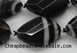 CAA286 22*30mm twisted & faceted oval black line agate beads