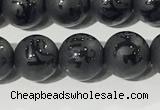 CAA3675 15.5 inches 6mm round matte & carved black agate beads