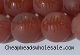 CAA3689 15.5 inches 12mm round matte & carved red agate beads