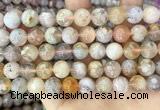 CAA5251 15.5 inches 10mm round sakura agate beads wholesale