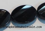 CAB816 15.5 inches 22*30mm faceted & twisted oval black agate beads