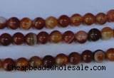 CAG2321 15.5 inches 6mm round red line agate beads wholesale