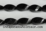 CAG4009 15.5 inches 8*16mm faceted & twisted rice black agate beads