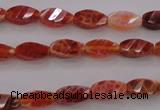 CAG4180 15.5 inches 6*12mm faceted & twisted rice natural fire agate beads