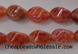 CAG4184 15.5 inches 6*10mm twisted rice natural fire agate beads