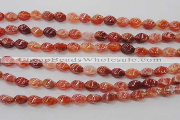 CAG4184 15.5 inches 6*10mm twisted rice natural fire agate beads