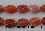 CAG4238 15.5 inches 10*14mm twisted oval natural fire agate beads