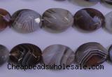 CAG4463 15.5 inches 12*16mm faceted oval botswana agate beads