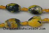 CAG5774 15 inches 10*14mm faceted rice fire crackle agate beads