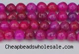 CAG9924 15.5 inches 4mm round fuchsia crazy lace agate beads