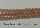 CBQ08 15.5 inches 6mm faceted round strawberry quartz beads