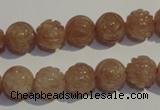 CBQ14 15.5 inches 10mm carved round strawberry quartz beads