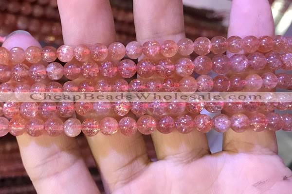 CBQ559 15.5 inches 6mm round golden strawberry quartz beads