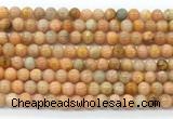 CCA551 15.5 inches 6mm round peach calcite gemstone beads