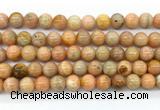 CCA553 15.5 inches 10mm round peach calcite gemstone beads