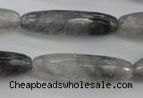 CCQ293 15.5 inches 10*35mm faceted rice cloudy quartz beads