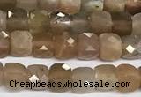 CCU1012 15 inches 4mm faceted cube sunstone beads