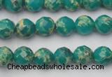 CDE2170 15.5 inches 6mm faceted round dyed sea sediment jasper beads