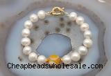 CFB1037 Hand-knotted 9mm - 10mm potato white freshwater pearl & yellow banded agate bracelet