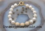 CFB1043 Hand-knotted 9mm - 10mm potato white freshwater pearl & white fossil jasper bracelet