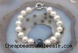 CFB1050 Hand-knotted 9mm - 10mm potato white freshwater pearl & sodalite bracelet