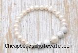 CFB612 6-7mm potato white freshwater pearl & white howlite stretchy bracelet