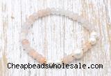 CFB711 faceted rondelle pink aventurine & potato white freshwater pearl stretchy bracelet