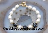 CFB923 Hand-knotted 9mm - 10mm rice white freshwater pearl & black banded agate bracelet