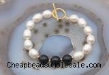 CFB976 Hand-knotted 9mm - 10mm rice white freshwater pearl & black obsidian bracelet