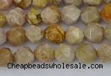 CFC236 15.5 inches 6mm faceted nuggets fossil coral beads