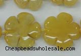 CFG458 15.5 inches 24mm carved flower yellow jade beads