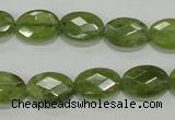 CGA101 15.5 inches 10*14mm faceted oval natural green garnet beads