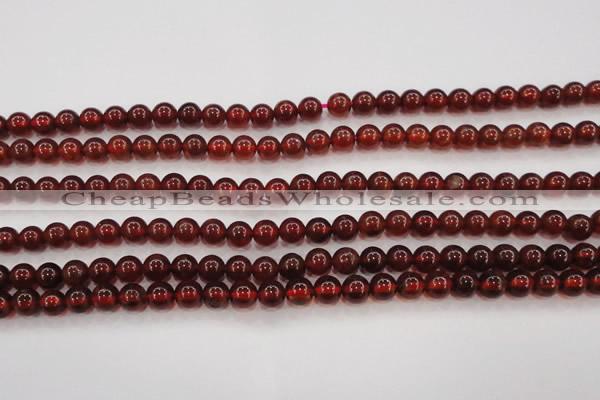 CGA601 15.5 inches 6mm A grade round natural orange garnet beads