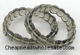 CGB3463 7.5 inches 10*14mm faceted oval smoky quartz bracelets