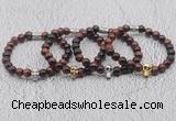 CGB6015 8mm round red tiger eye bracelet with skull for men