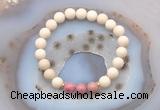 CGB6468 8mm round matte white fossil jasper & pink wooden jasper beaded bracelets