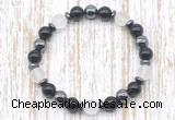 CGB8320 8mm matte white crystal, black onyx & hematite energy bracelet