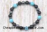 CGB8379 8mm blue howlite, black onyx & hematite energy bracelet