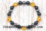 CGB8411 8mm synthetic amber, black onyx & hematite energy bracelet