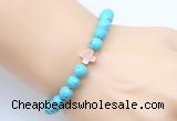 CGB9352 8mm, 10mm blue howlite & cross hematite power beads bracelets