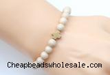 CGB9360 8mm, 10mm white fossil jasper & cross hematite power beads bracelets