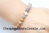 CGB9434 8mm, 10mm matte fossil coral & cross hematite power beads bracelets