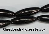 CJB54 15.5 inches 10*30mm rice natural jet gemstone beads