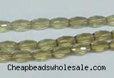 CLQ10 15.5 inches 6*10mm faceted rice natural lemon quartz beads