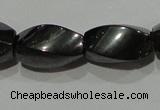 CMH154 15.5 inches 8*14mm twisted rice magnetic hematite beads